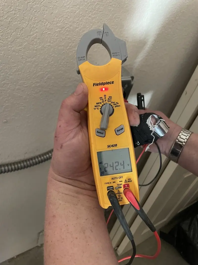 Voltage testing with clamp meter during Aluminum Wiring Replacement in Woodcliff Lake